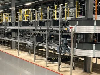 Utz containers transported on conveyor belt in The Very Group warehouse